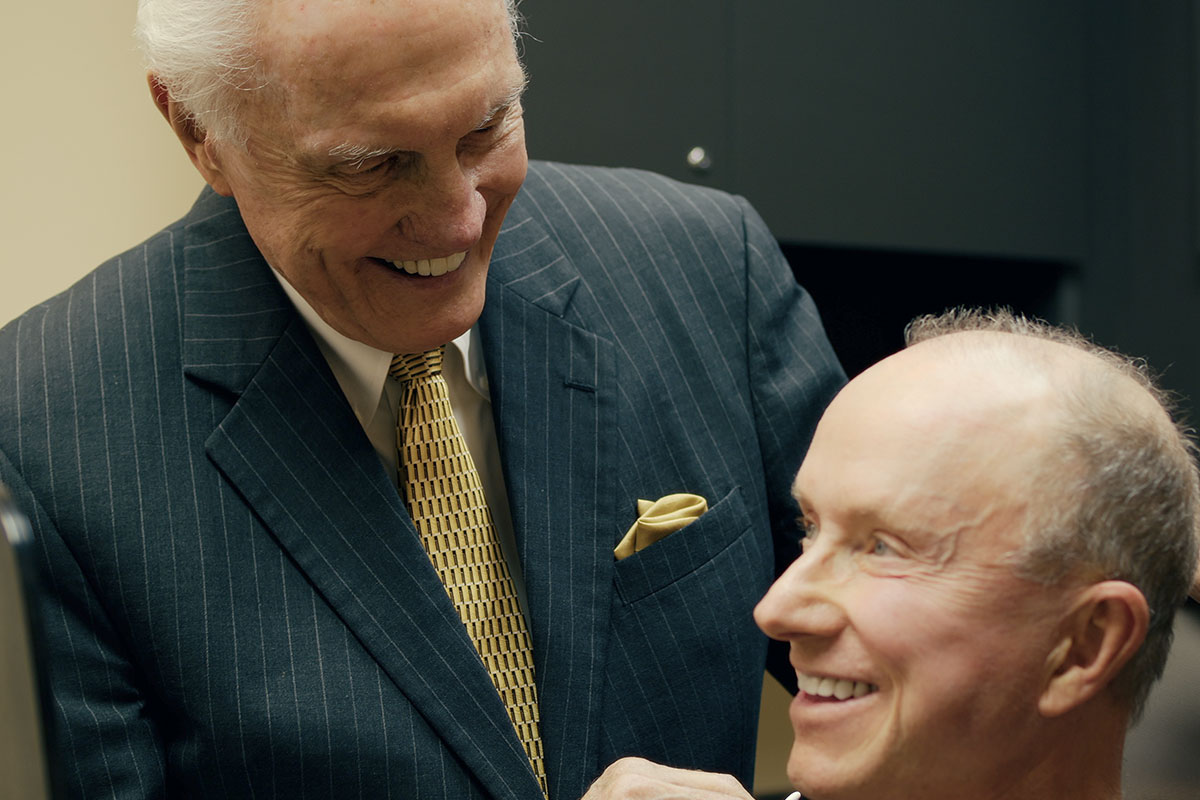 doctor consulting patient about chin augmentation in Gulf Shores, AL