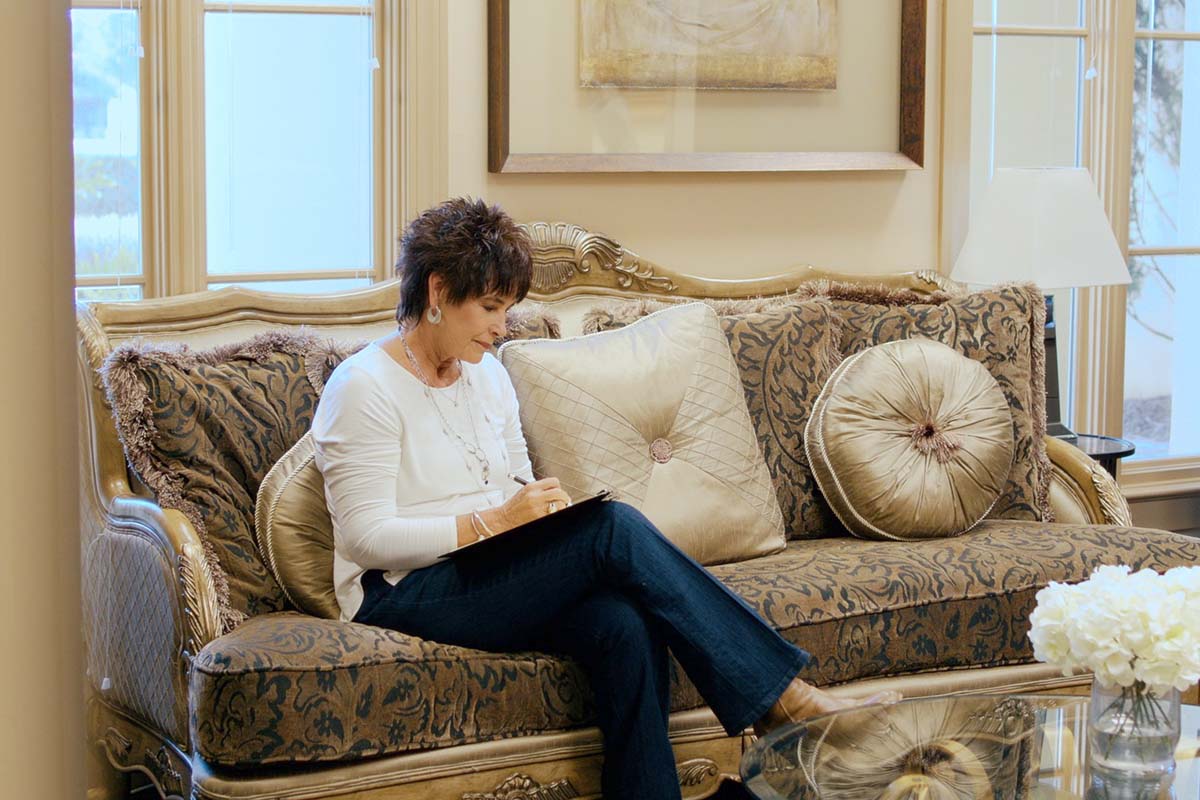 Patient filling out form for Botox in Gulf Shores, AL